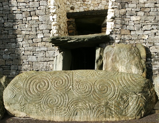 Carved Stone in front of entrance with Sun Box above